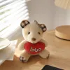 The beige bear pendant is decorated with red heart-shaped "love" embroidered characters details Picture